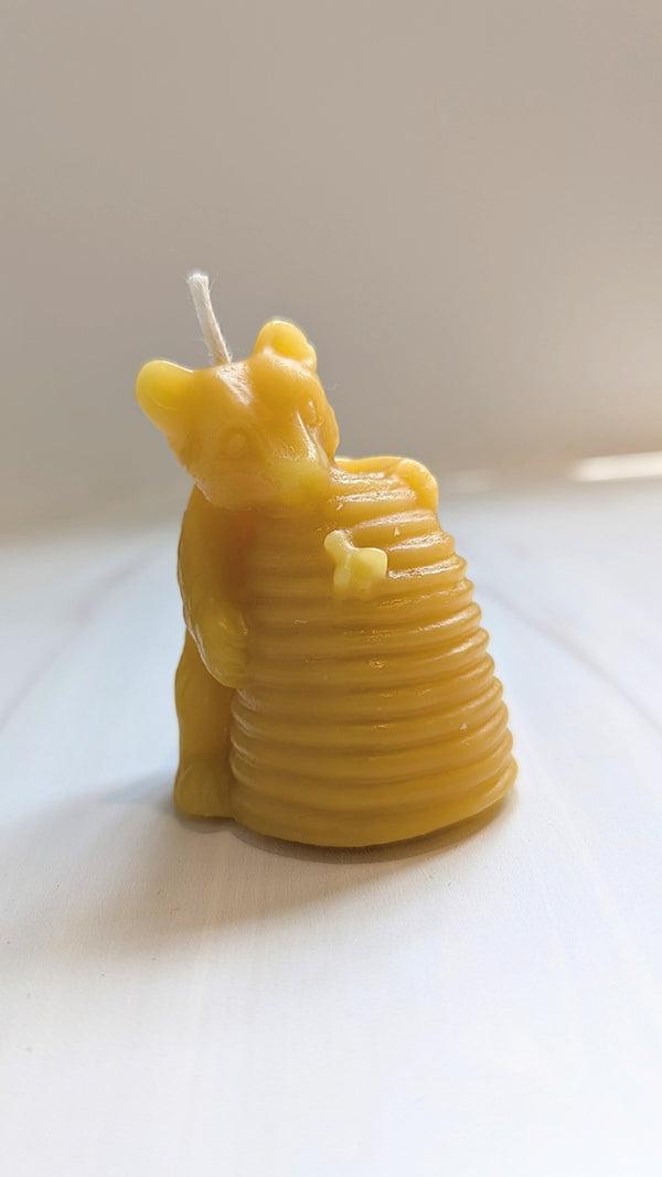 bear hugging hive candle